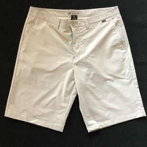 Travis Mathew khaki golf shorts